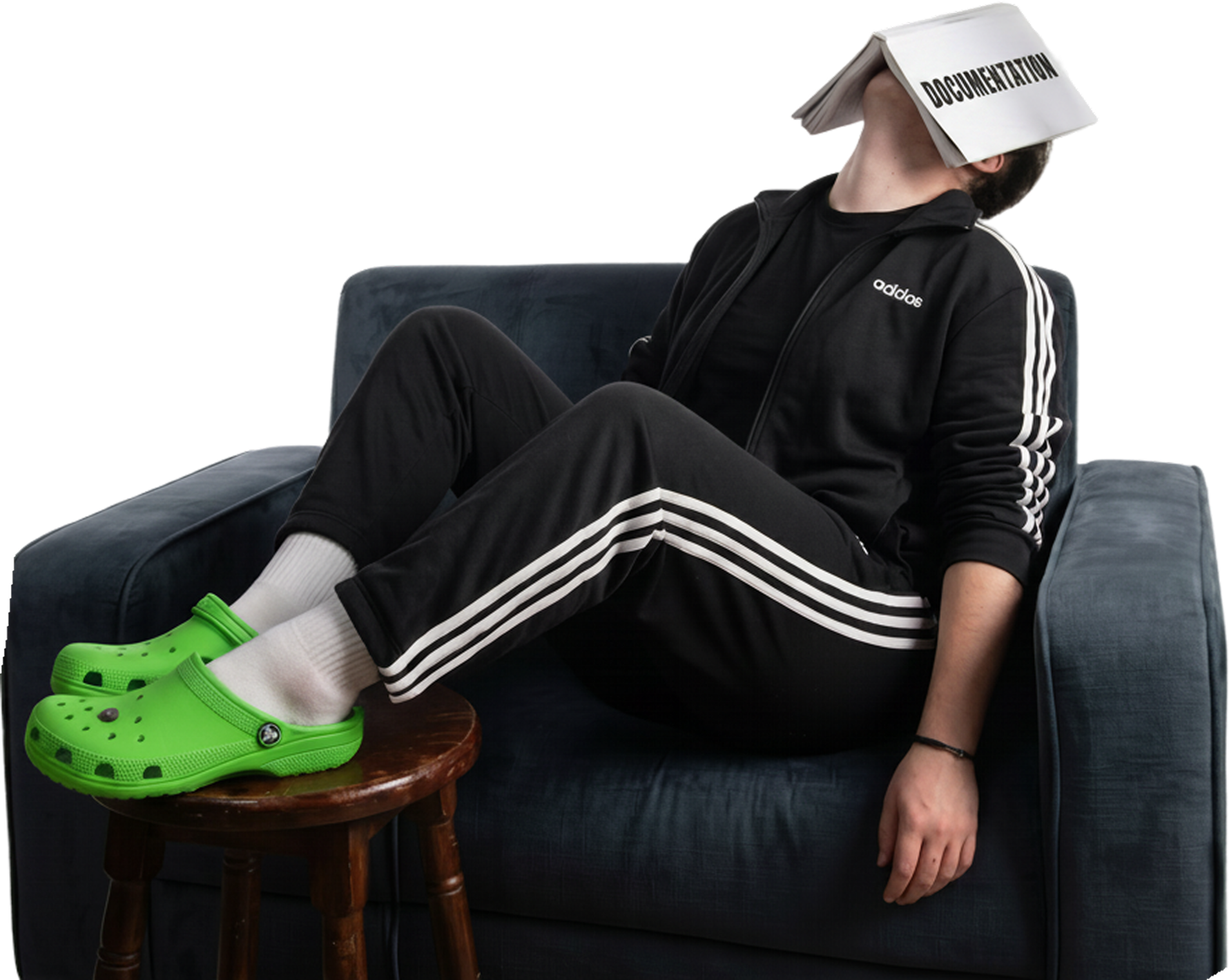 Person reclined with a documentation book over their face