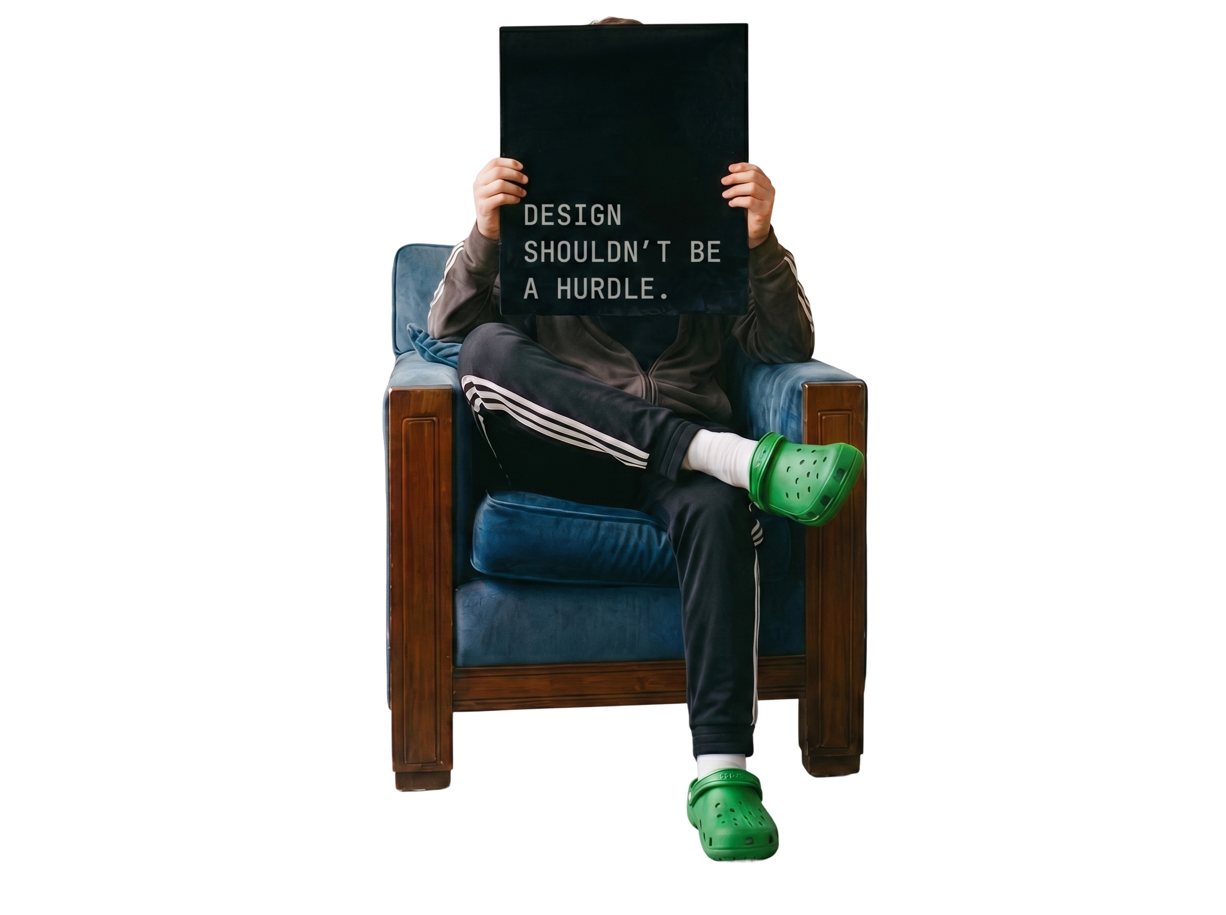 Person on a chair holding a sign reading: design shouldn't be a hurdle